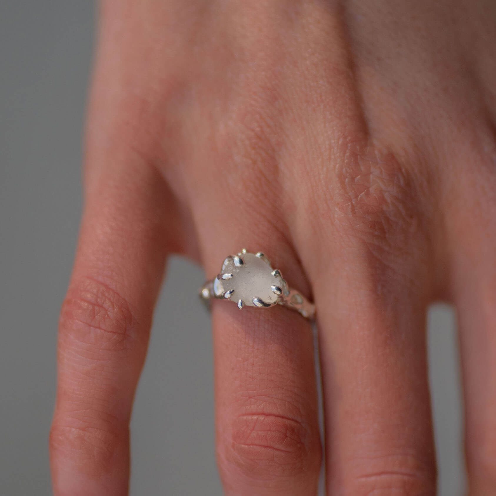 white_stone_hand _square