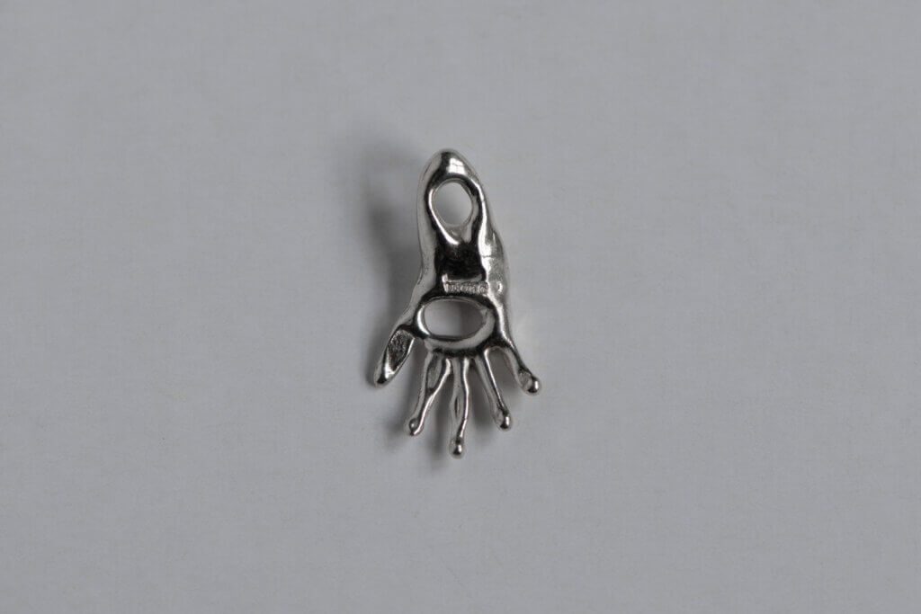 Hand charm